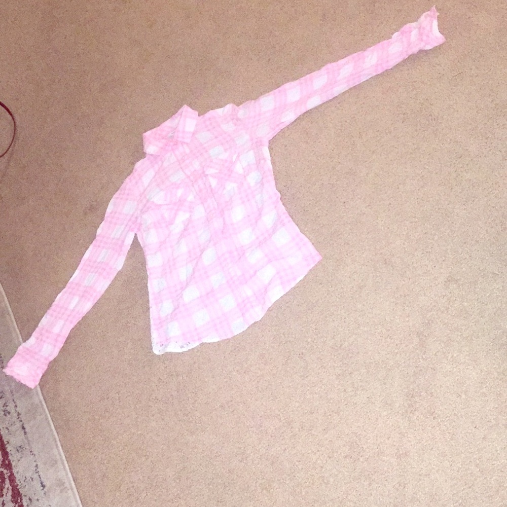 Cute pink and white plaid shirt.